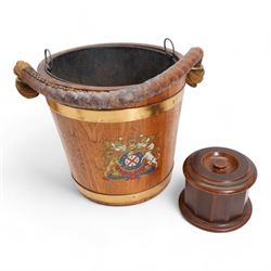 Oak and brass banded fire bucket decorated with the Royal Coat of Arms with liner and rope twist handle H30cm, together with a Dunhill 'The White Spot' faceted mahogany tobacco jar and cover (2)