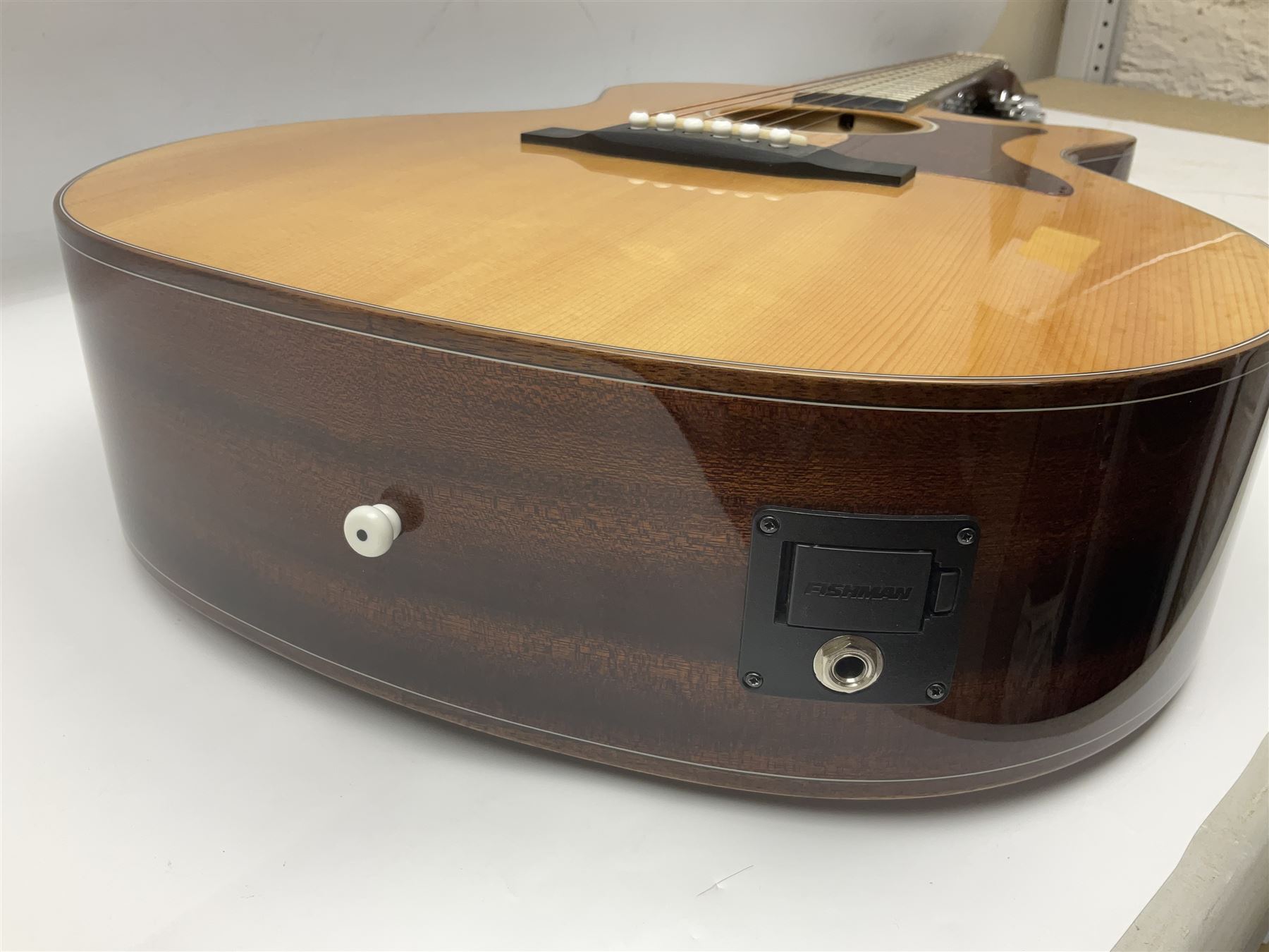 Sigma GMC-1E semi-acoustic guitar with cut-away body, sapele mahogany back and ribs and solid spruce top; bears label Model GMC-1E serial no.210522747; L103cm