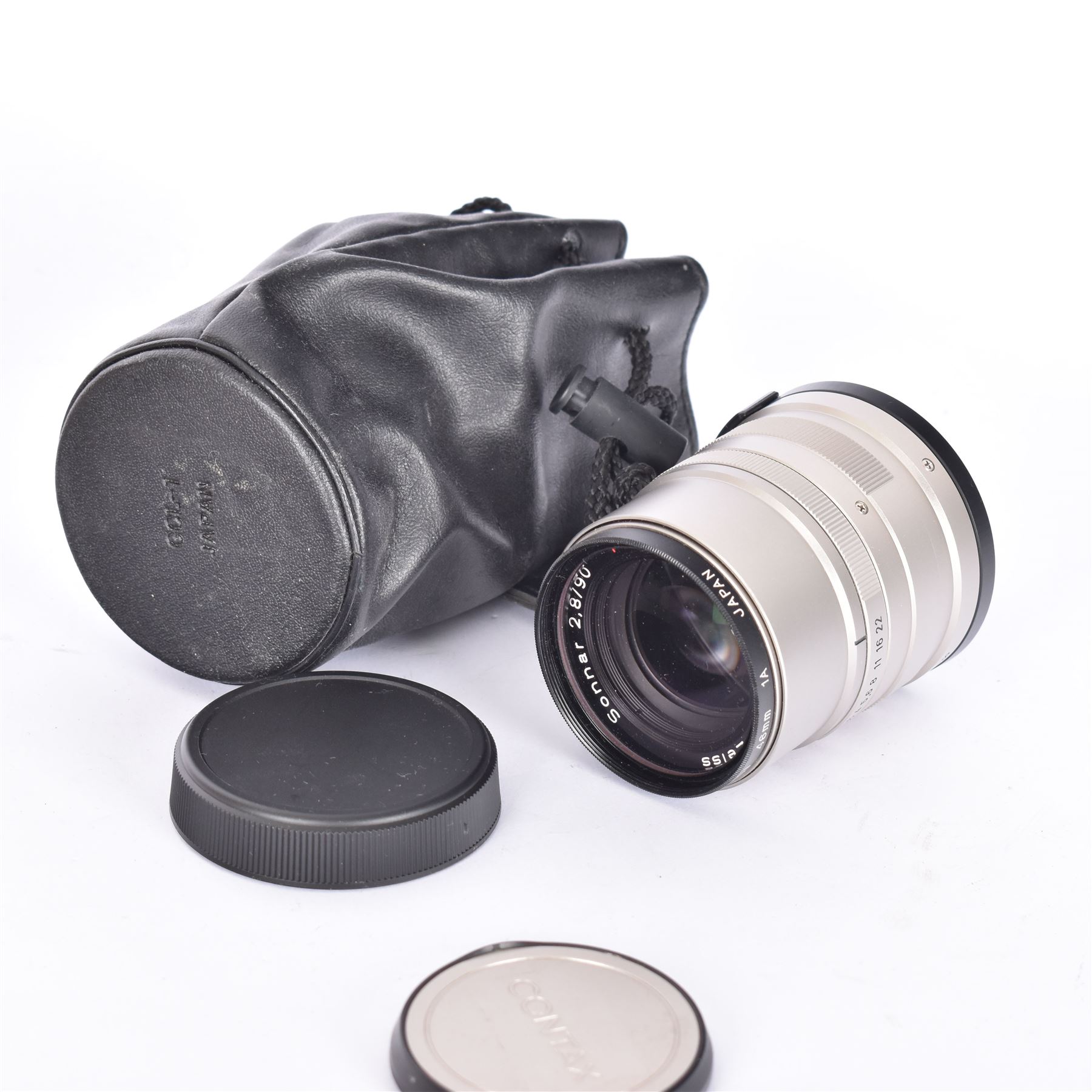 Carl Zeiss Sonnar 2.8/90 90mm T* lens, serial no. 7749538, boxed with soft case and two lens caps