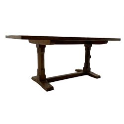 Rabbitman - oak dining table, rectangular adzed top, twin octagonal pillar supports on sledge feet, united by floor stretcher, carved with rabbit signature, by Peter Heap of Wetwang 