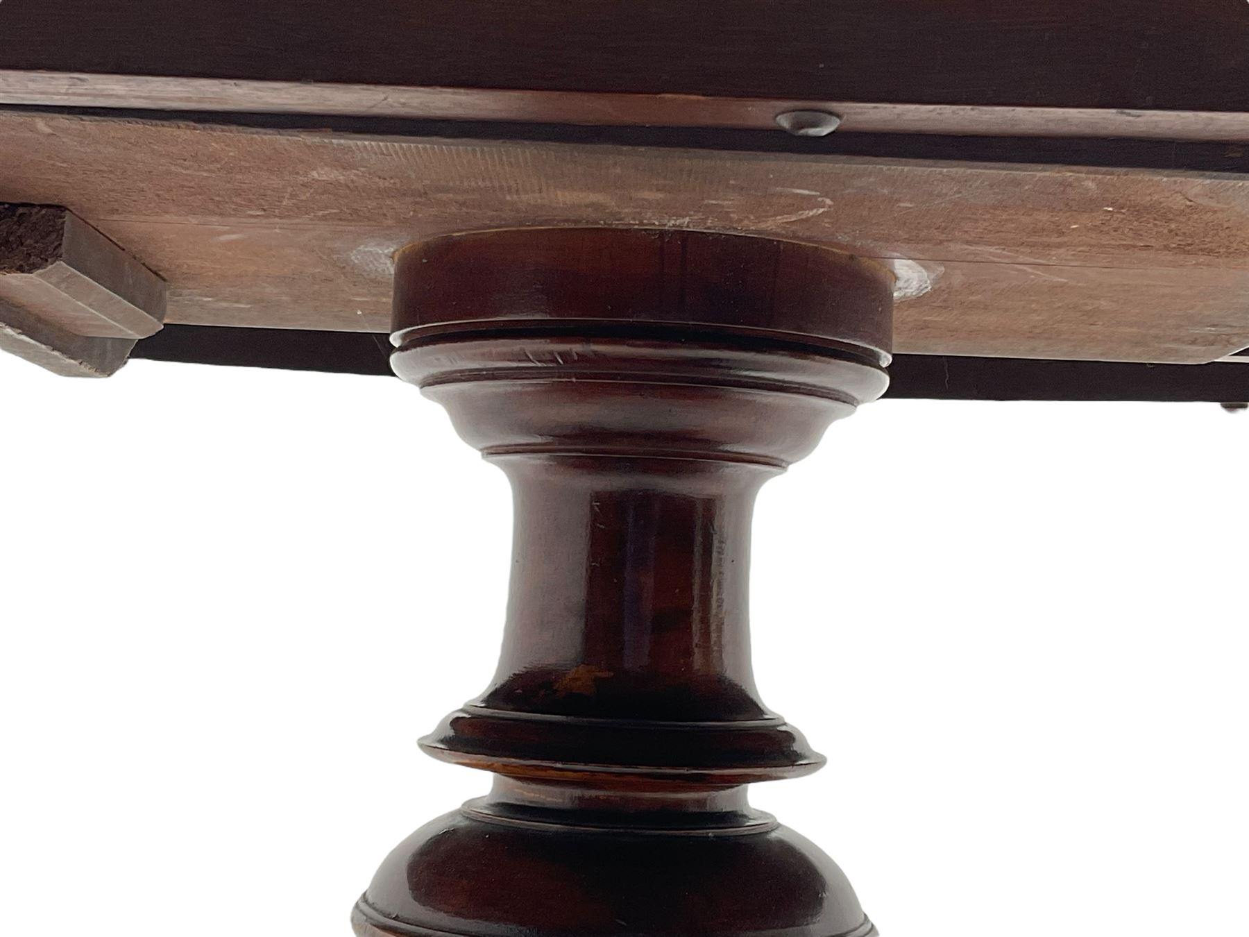 Victorian mahogany loo or dining table, oval moulded tilt-top on turned pedestal, four out splayed supports with scrolled carved terminals (137cm x 101cm, H75cm); together with set of four Victorian dining chairs upholstered in pale buttoned fabric, on turned front supports with brass and ceramic castors  