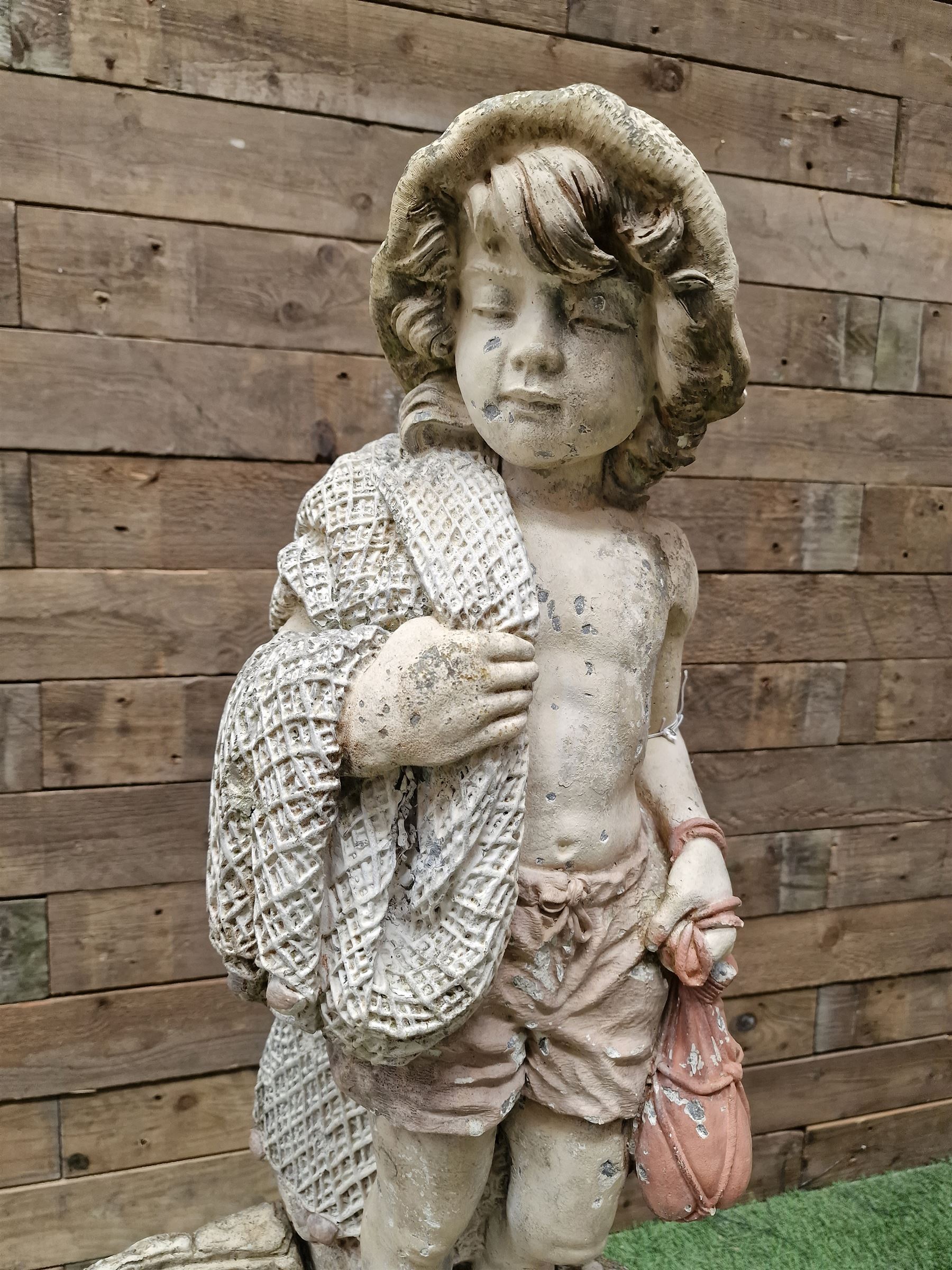 Three section cast stone garden figure of a boy carrying fishing net and a satchel with a water feature together with a cast stone planter on plinth - THIS LOT IS TO BE COLLECTED BY APPOINTMENT FROM DUGGLEBY STORAGE, GREAT HILL, EASTFIELD, SCARBOROUGH, YO11 3TX