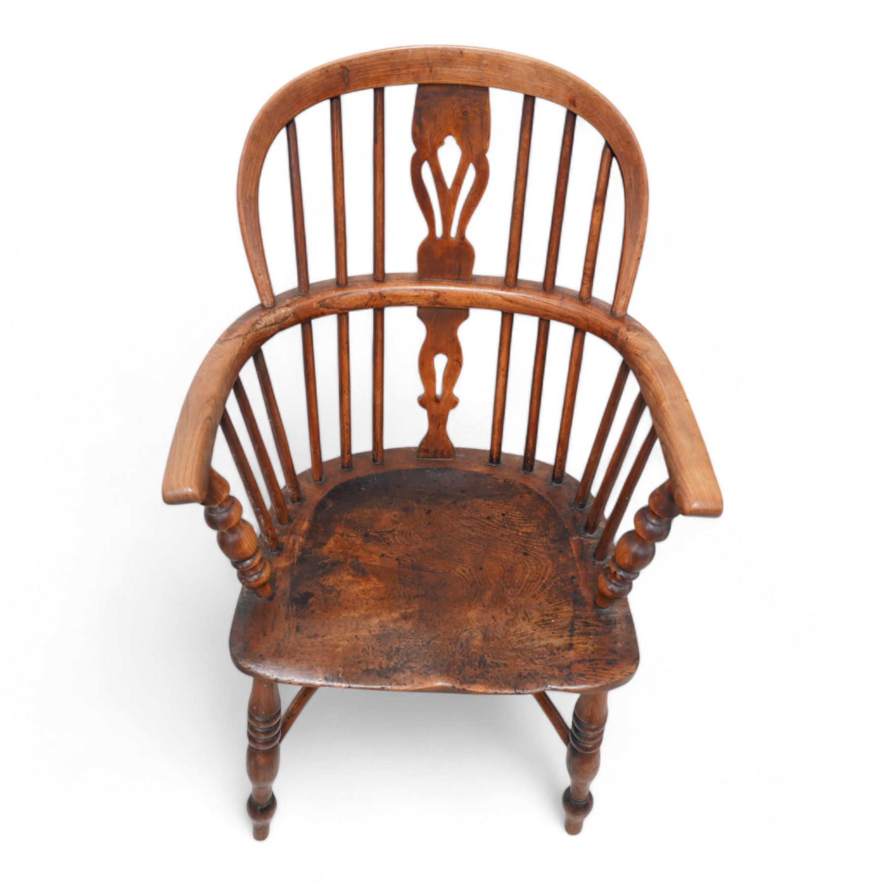 Near pair of 19th century elm and ash Windsor armchairs, each with double hoop and stick back with shaped and pierced splat, dished seat on turned supports united by crinoline stretcher 