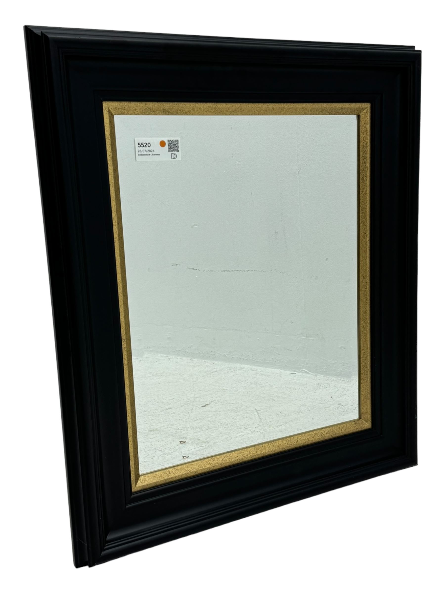 Contemporary gilt framed and ebonised mirror, rectangular broad black outer frame with inner gilt border, bevelled mirror plate 