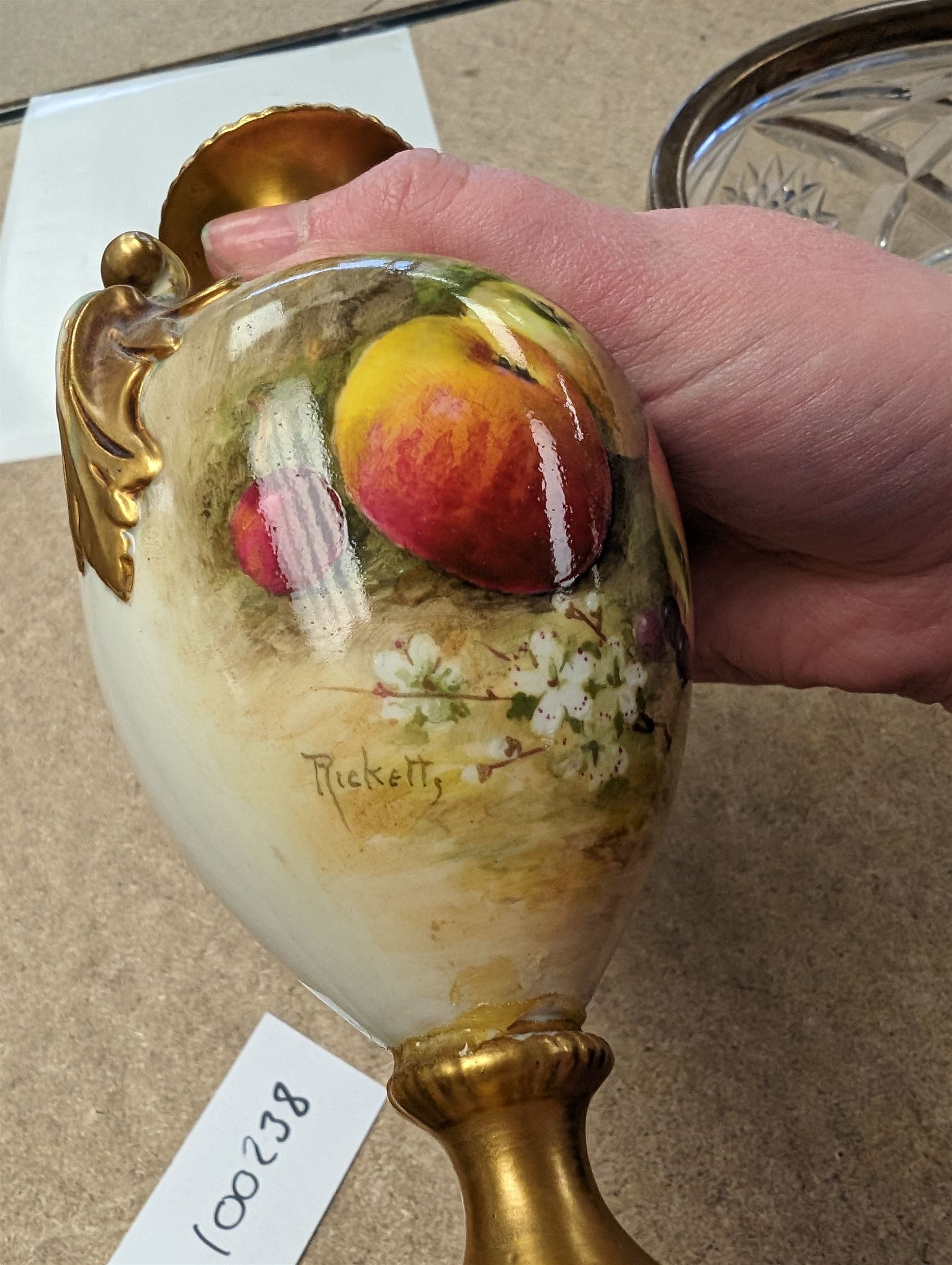 Royal Worcester vase, decorated with fruits among blossom with gilt detailing, H17cm