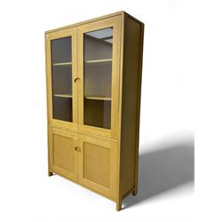 Light oak display cabinet, two glazed doors over two panelled doors, fitted with adjustable shelves