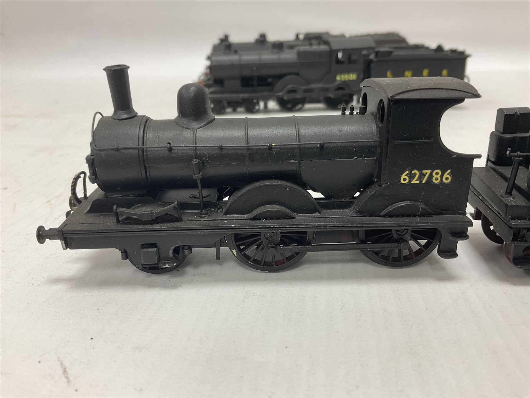 ‘00’ gauge - four kit built steam locomotives and tenders comprising LNWR Experiment Class ‘Stephenson’ 4-6-0 no.2052 finished in LMS black; Class D10 ‘Sir Edward Fraser’ 4-4-0 no.62653 finished in BR black; Class D14 4-4-0 no.62501 finished in BR black with LNER tender; Class E4 2-4-0 no.62786 finished in BR black (4) 