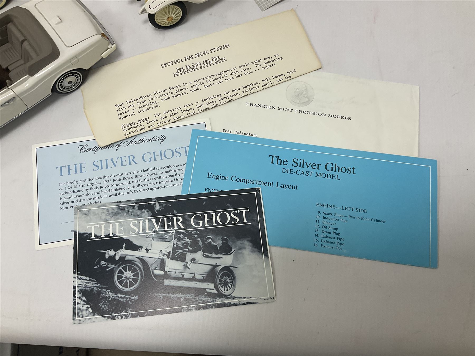 Franklin Mint - six 1:24 scale die-cast Rolls-Royce models comprising 1907 Rolls-Royce ‘The Silver Ghost’, boxed with original packaging and paperwork, 1929 Rolls-Royce ‘Phantom I’ with original packing, 1914 Rolls-Royce, 1911 Rolls-Royce, 1955 Rolls-Royce ‘Silver Cloud 1’, and 1992 Rolls-Royce Corniche IV 