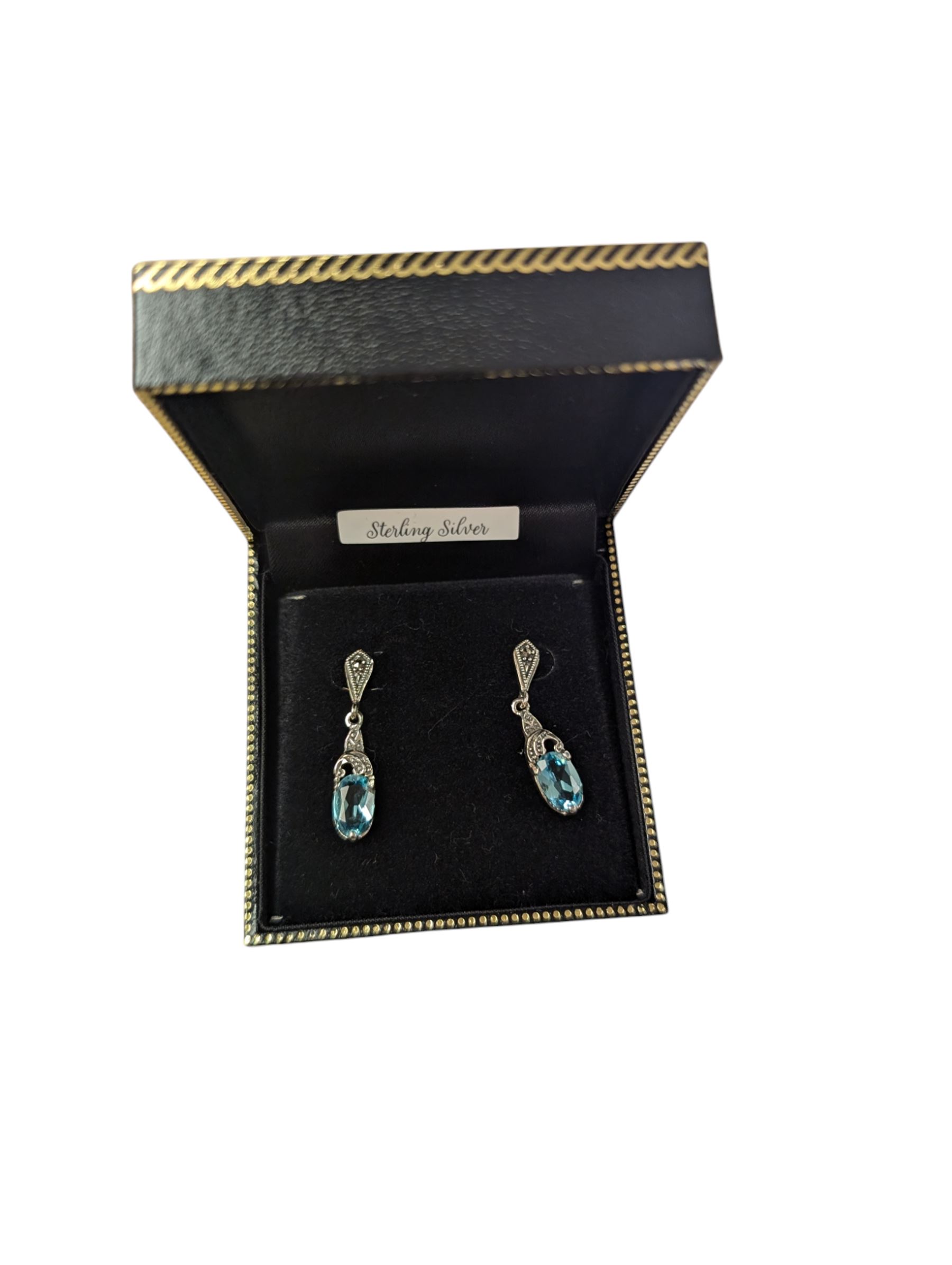 Pair of silver marcasite and blue stone pendant earrings, boxed 