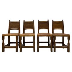 Gnomeman - set of eight (6+2) oak dining chairs, adzed panelled back over tan leather upholstered seat with applied stud band, on square supports united by plain stretchers, each chair carved with gnome signature, by Thomas Whittaker, Littlebeck, Whitby