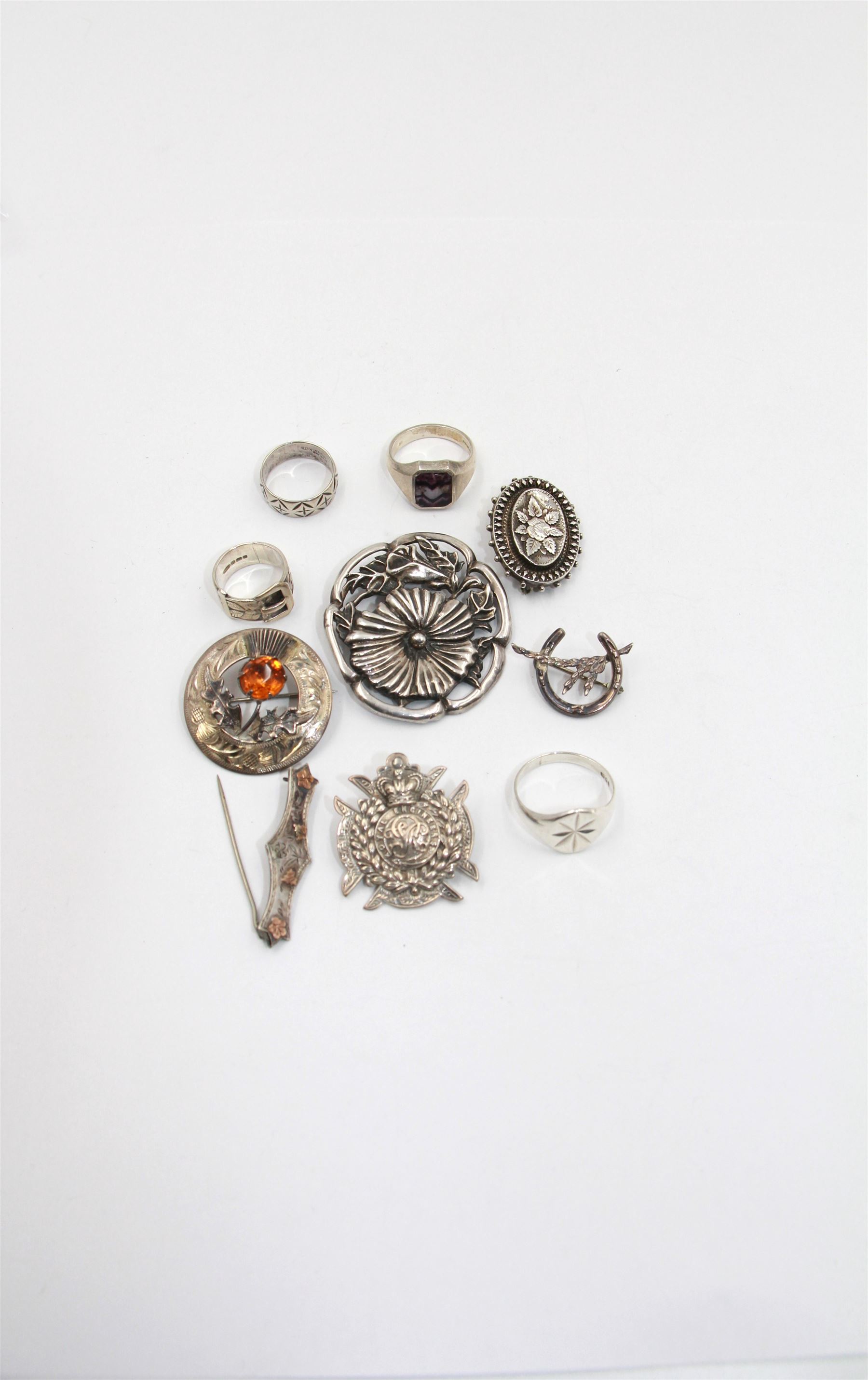 Victorian and later silver jewellery, including embossed buckle ring, Scottish silver thistle brooch, signet ring etc