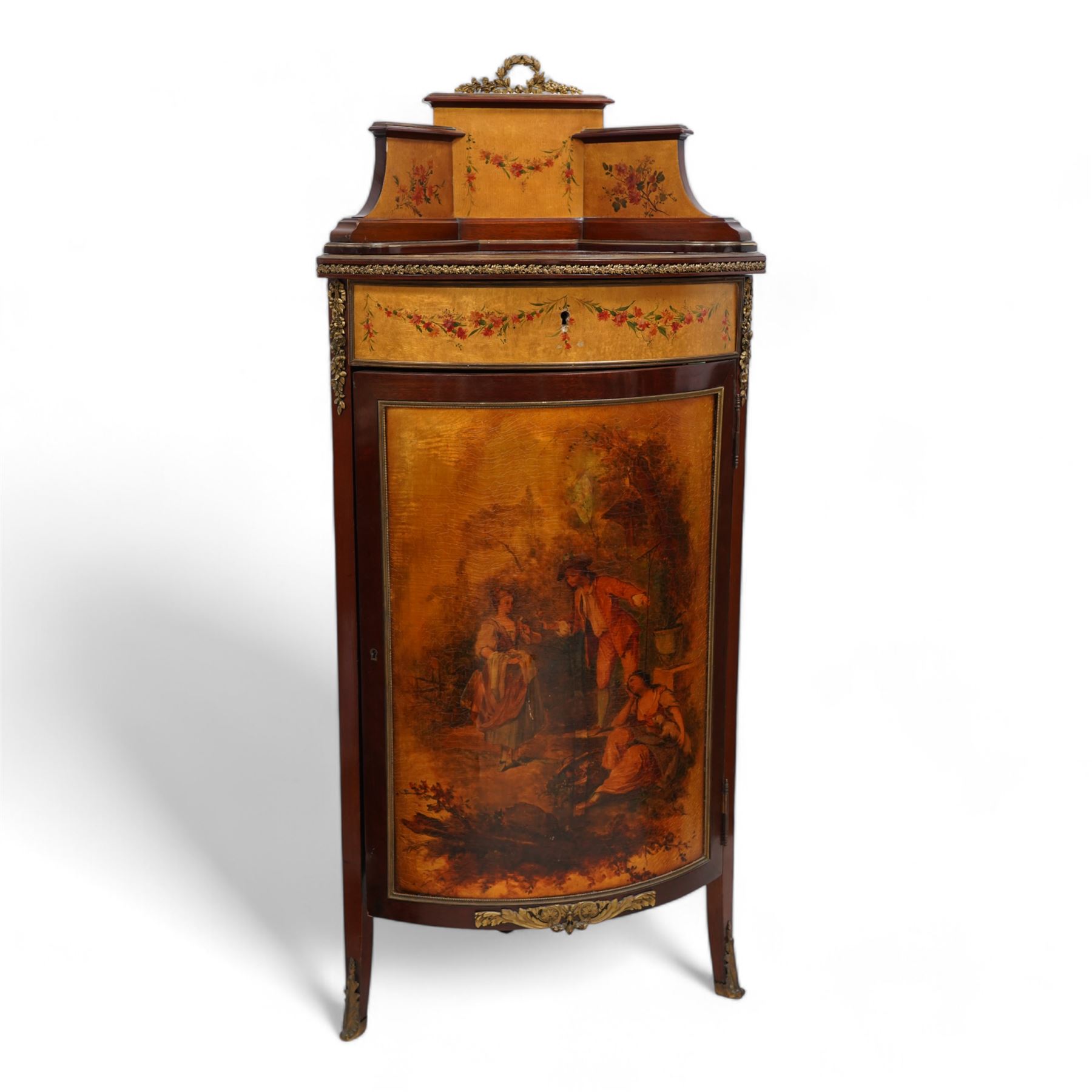 Mid-to-late 20th century mahogany and gilt metal mounted corner cupboard, raised back with floral decoration surmounted by laurel leaf wreath, single hinged drawer decorated with floral festoons, enclosed by single door with Vernis Martin design panel, on out splayed feet with foliate mounts 