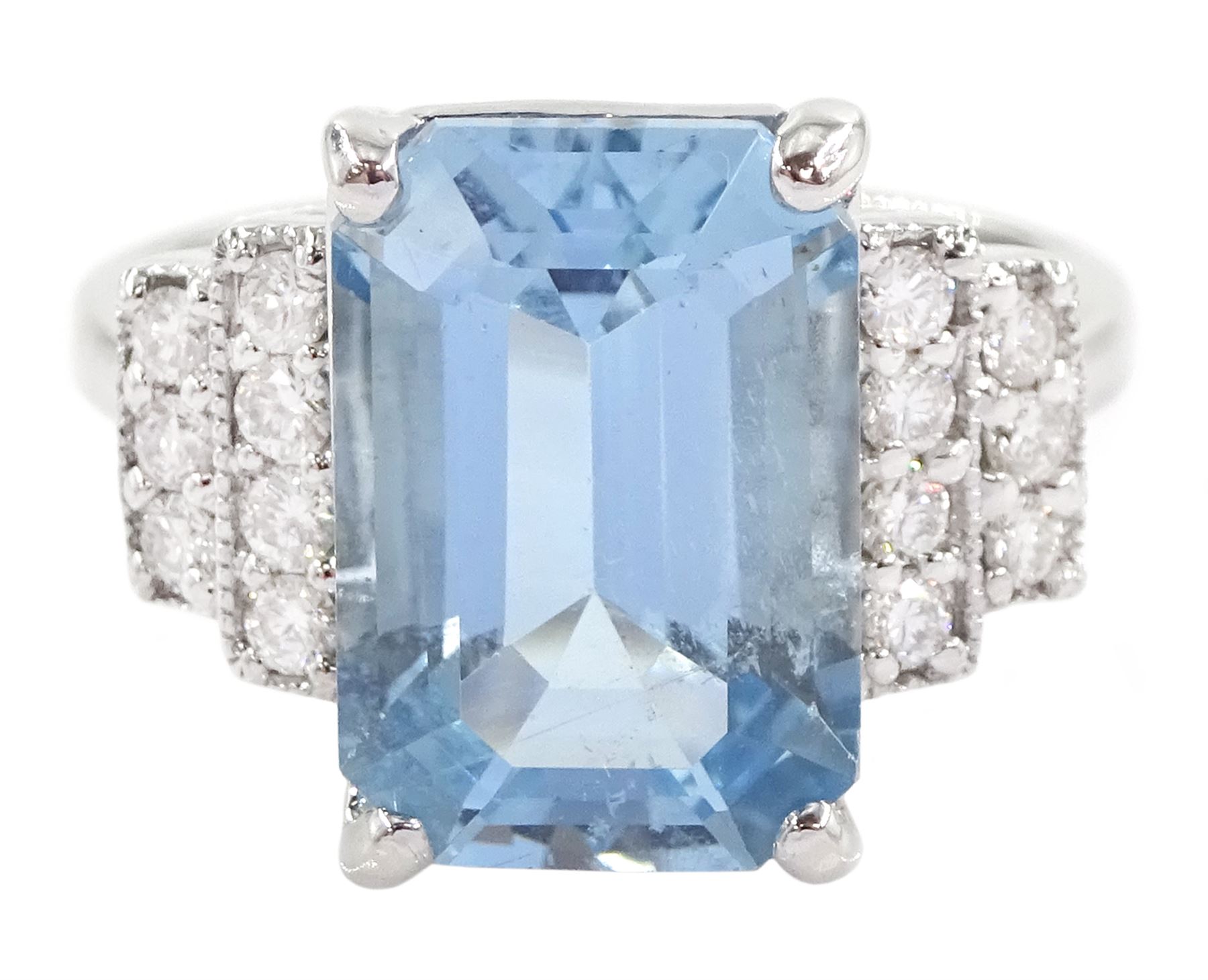 18ct white gold emerald cut aquamarine ring, with stepped design round brilliant cut diamond shoulders, stamped 750, aquamarine approx 4.90 carat, total diamond weight approx 0.30 carat