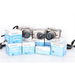 Four Minolta Vectis cameras bodies, to include two Vectis S-1 examples, serial nos. 96622420 & 02629088 and two Vectis S-100 examples, serial nos. 98713950 & 98704095, together with a collection of Minolta Vectis accessories and lenses, including boxed examples