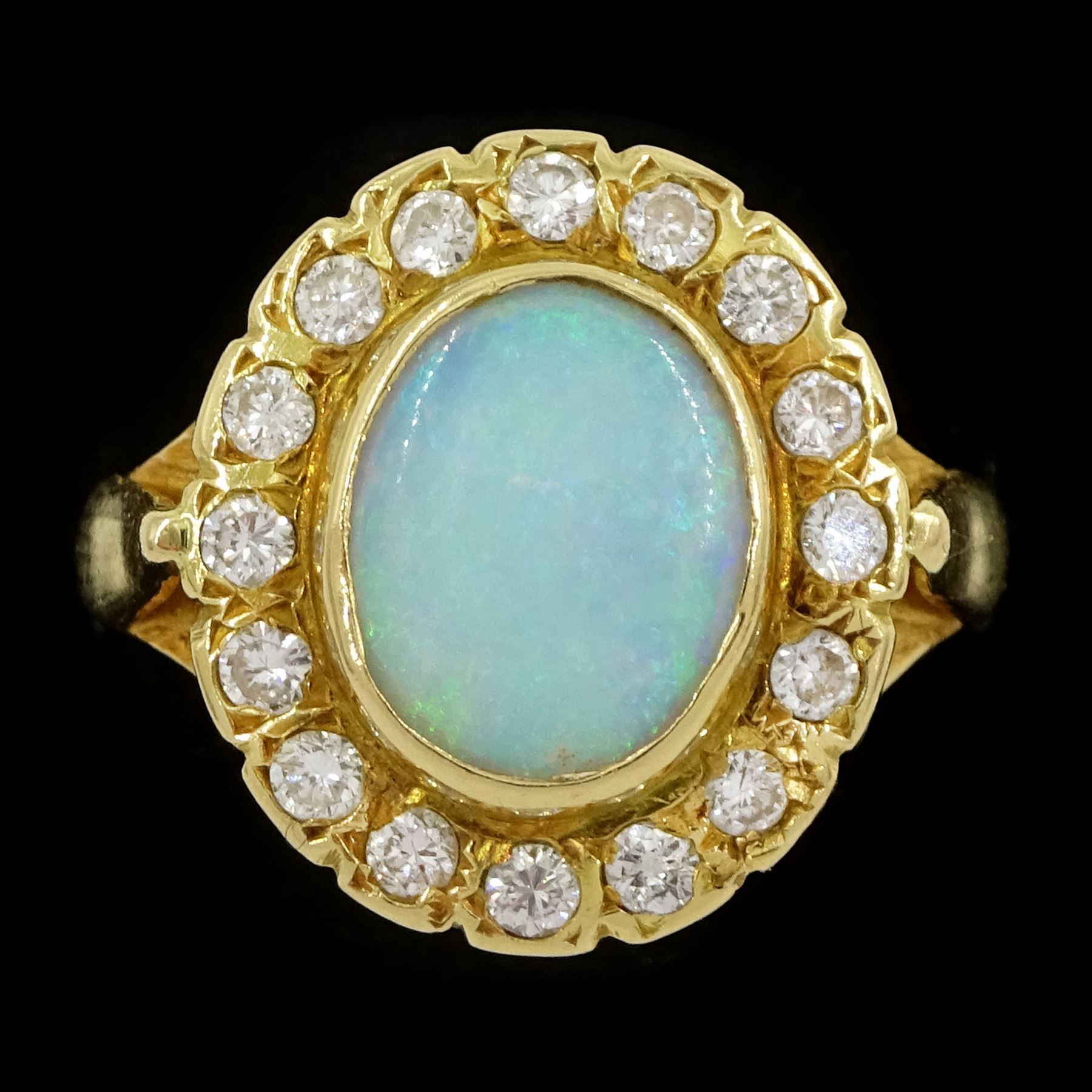 18ct gold opal and round brilliant cut diamond cluster ring, London 1989