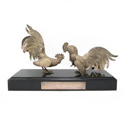 'The Northern Goldsmiths Sweepstakes 1975, Winner Aviator, Owner Guy Reed, Trainer Sam Hall' - A silver trophy modelled as two fighting cockerels on an ebonised plinth with plaque H24cm x W38cm import mark and makers mark for Israel Freeman & Son