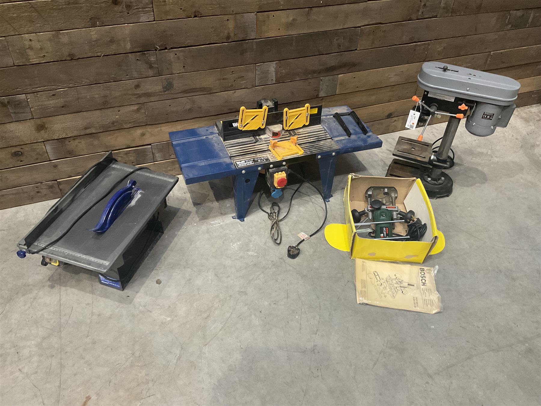 Terratek pillar drill, Wolf router with table, Bosch router and an Energer table saw