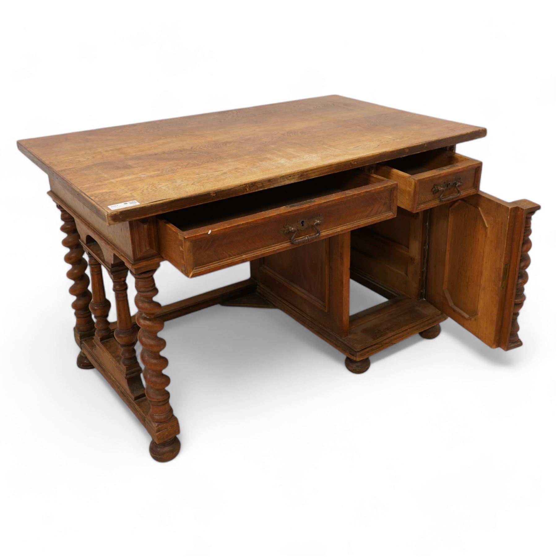 19th century oak desk, rectangular top over two drawers and cupboard, on spiral turned supports and turned bun feet