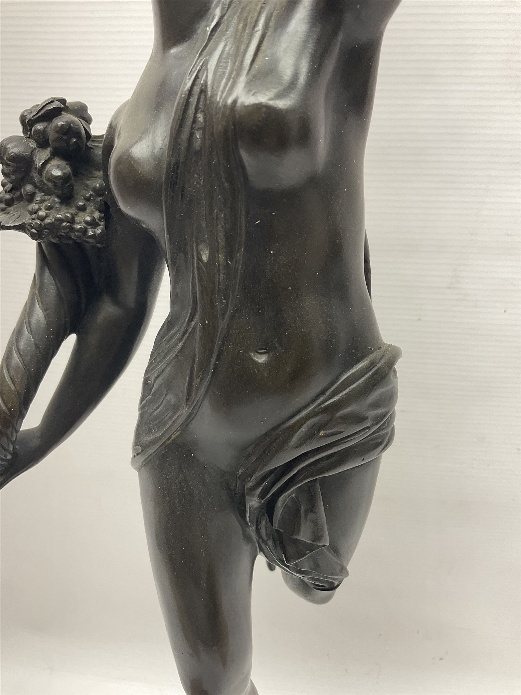 After Louis Guillaume Fulconis, a bronzed figure of Fortuna with cornucopia in her right hand and standing on a wheel on green serpentine base, height 60cm