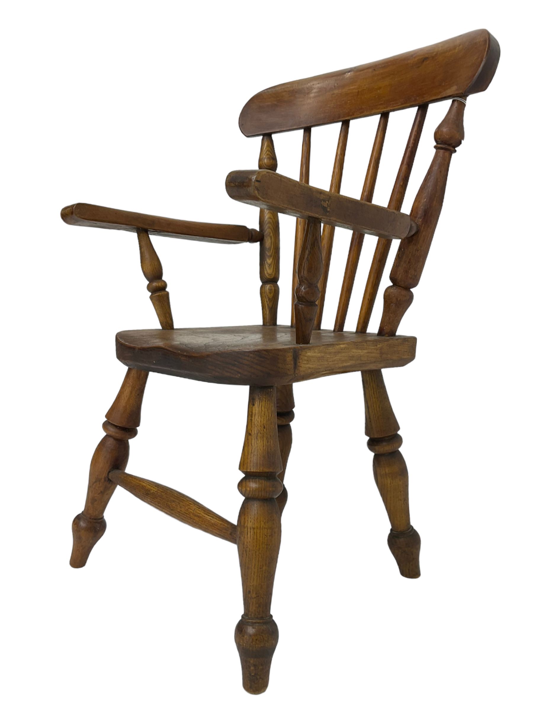 19th century elm and beech child's farmhouse chair, shaped cresting rail over stick back, on turned supports 