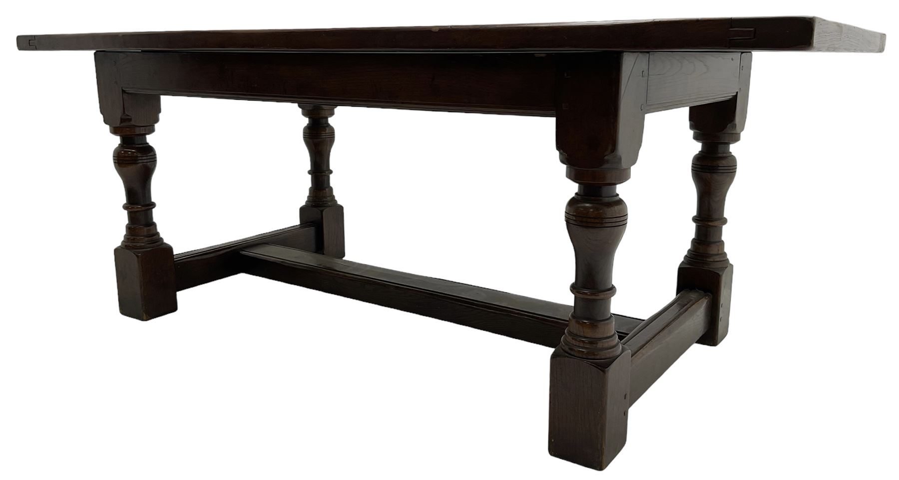 20th century oak refectory dining table, rectangular cleated top on turned supports joined by H-stretcher