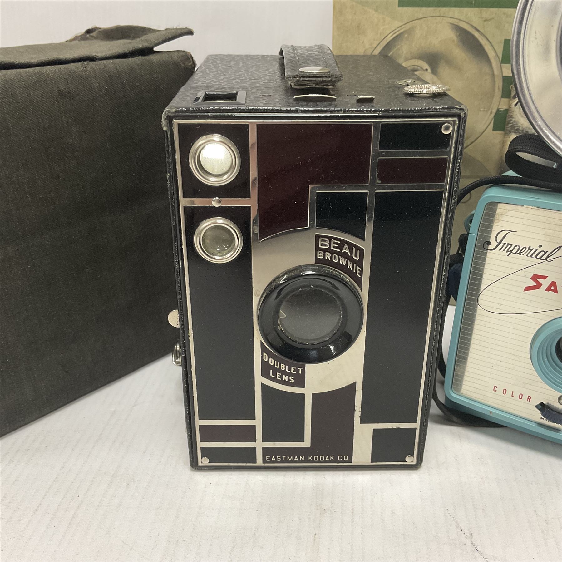 Eastman Kodak Beau Brownie Doublet Lens camera, in brown colourway, in canvas cary case, together with a Imperial Satellite 127 3-Way Flash Camera, model no 270, in original box