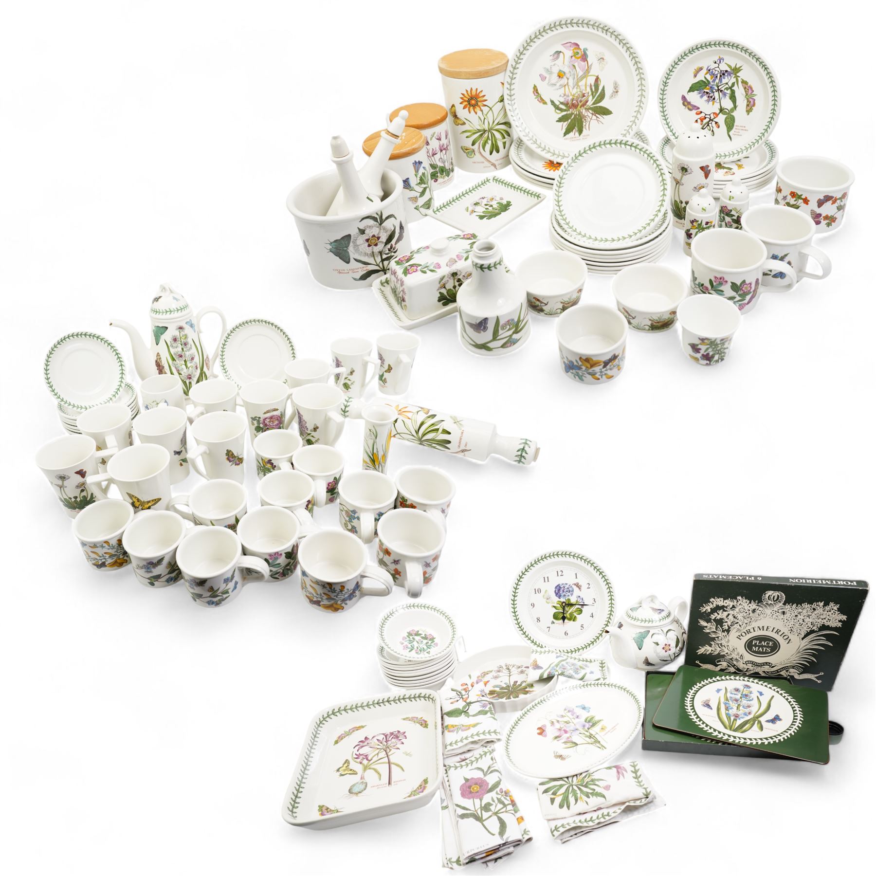 Portmeirion Botanic Garden tea, dinner and table wares to include a teapot, coffee pot, eleven mugs, rolling pin, wall clock, ten breakfast bowls, five dinner plates etc (qty)