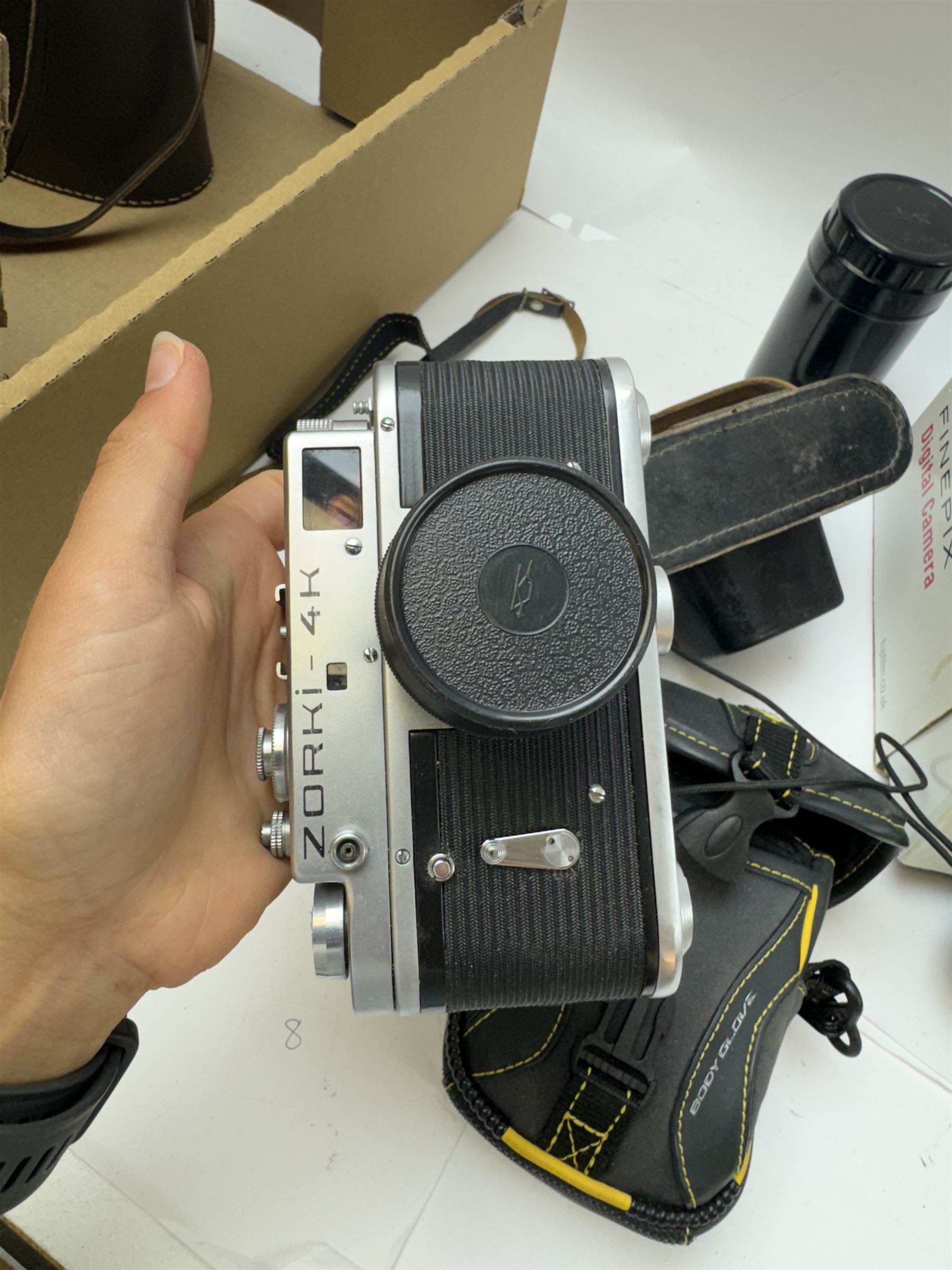 Collection of cameras, including Fujifilm Finepix S2980, boxed, Canon Powershot A540, Zorki 4K, etc together with a pair of Lieberman & Gortz binoculars