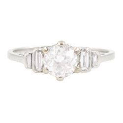 Art Deco platinum diamond ring, principal old cut diamond of approx 0.60 carat, with two g...