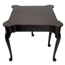 Late 18th century Irish mahogany tea table, rectangular form with projecting stepped rounded corners, fold-over action top over single frieze drawer within cock-beaded surround, on shell and bellflower carved cabriole supports, single gate-leg action base 