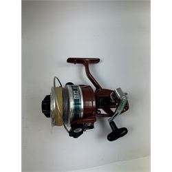 Four fishing reels, Winfield Beach fisher rod, Winfield International 20 , DAM International etc 