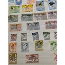 Mostly Commonwealth or Empire stamps including Queen Elizabeth II Northern Rhodesia, Nyasaland, Solomon Islands, Aden, Bermuda, Grenada 'Associated Statehood' overprints, King George VI Falkland Islands Dependencies with values to one shilling etc, mixture of mint and used, housed in a green stockbook