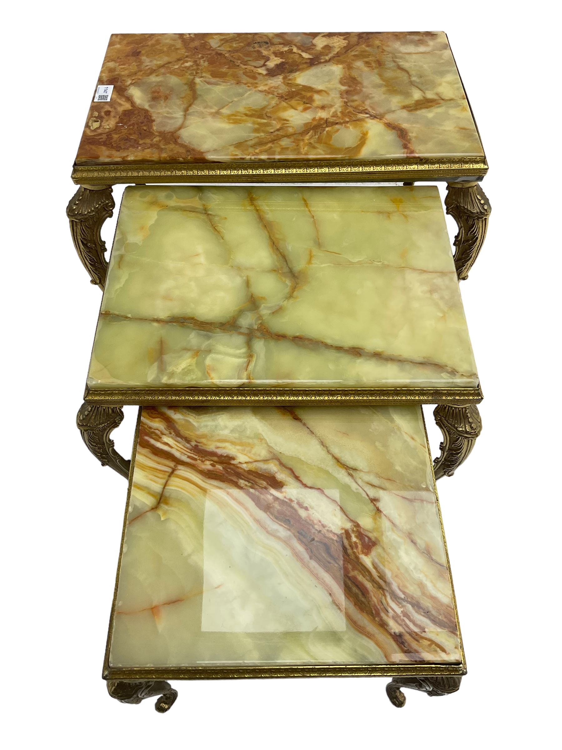 Mid-20th century Italian design onyx and gilt metal nest of three tables, rectangular tops raised on foliate decorated cabriole supports