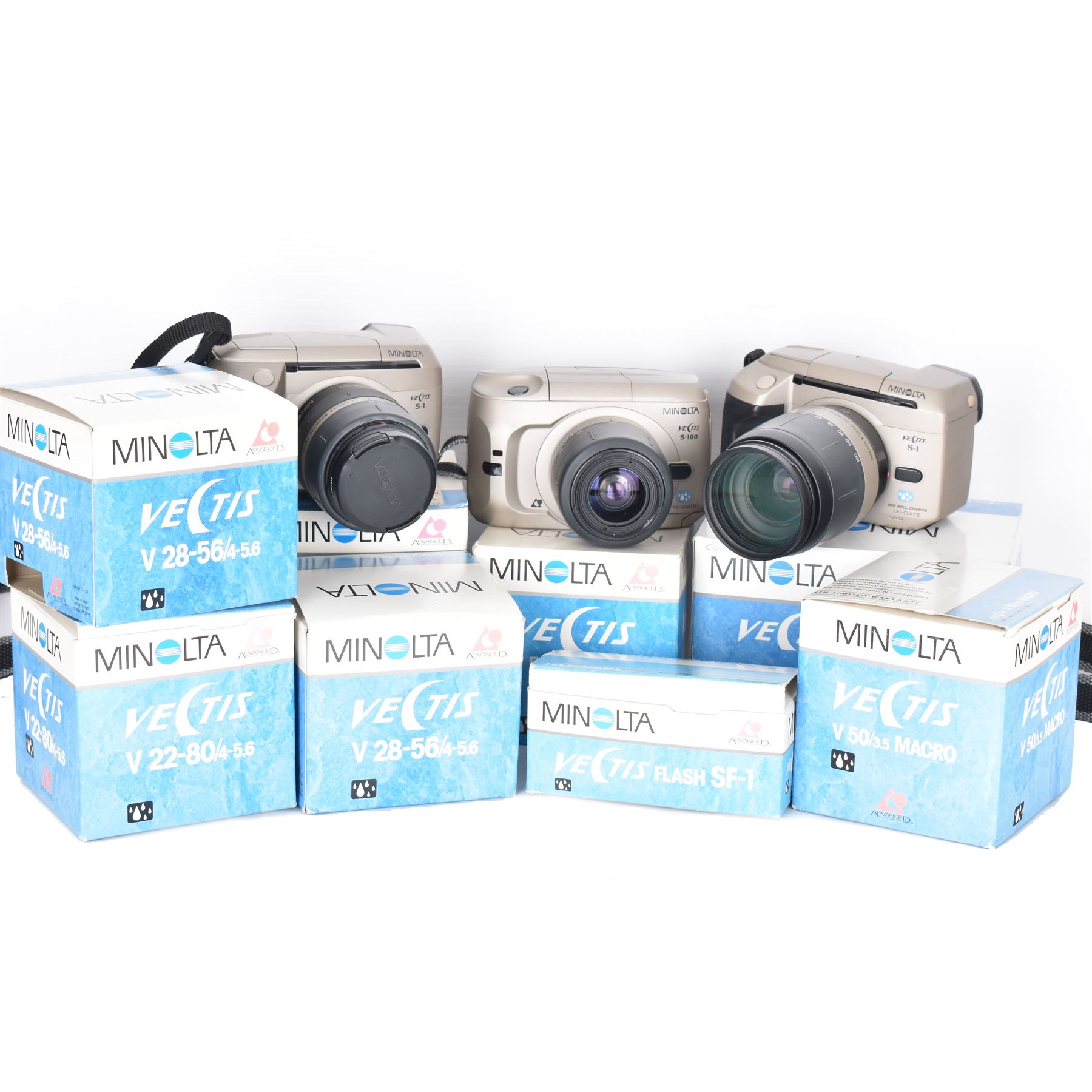 Four Minolta Vectis cameras bodies, to include two Vectis S-1 examples, serial nos. 96622420 & 02629088 and two Vectis S-100 examples, serial nos. 98713950 & 98704095, together with a collection of Minolta Vectis accessories and lenses, including boxed examples