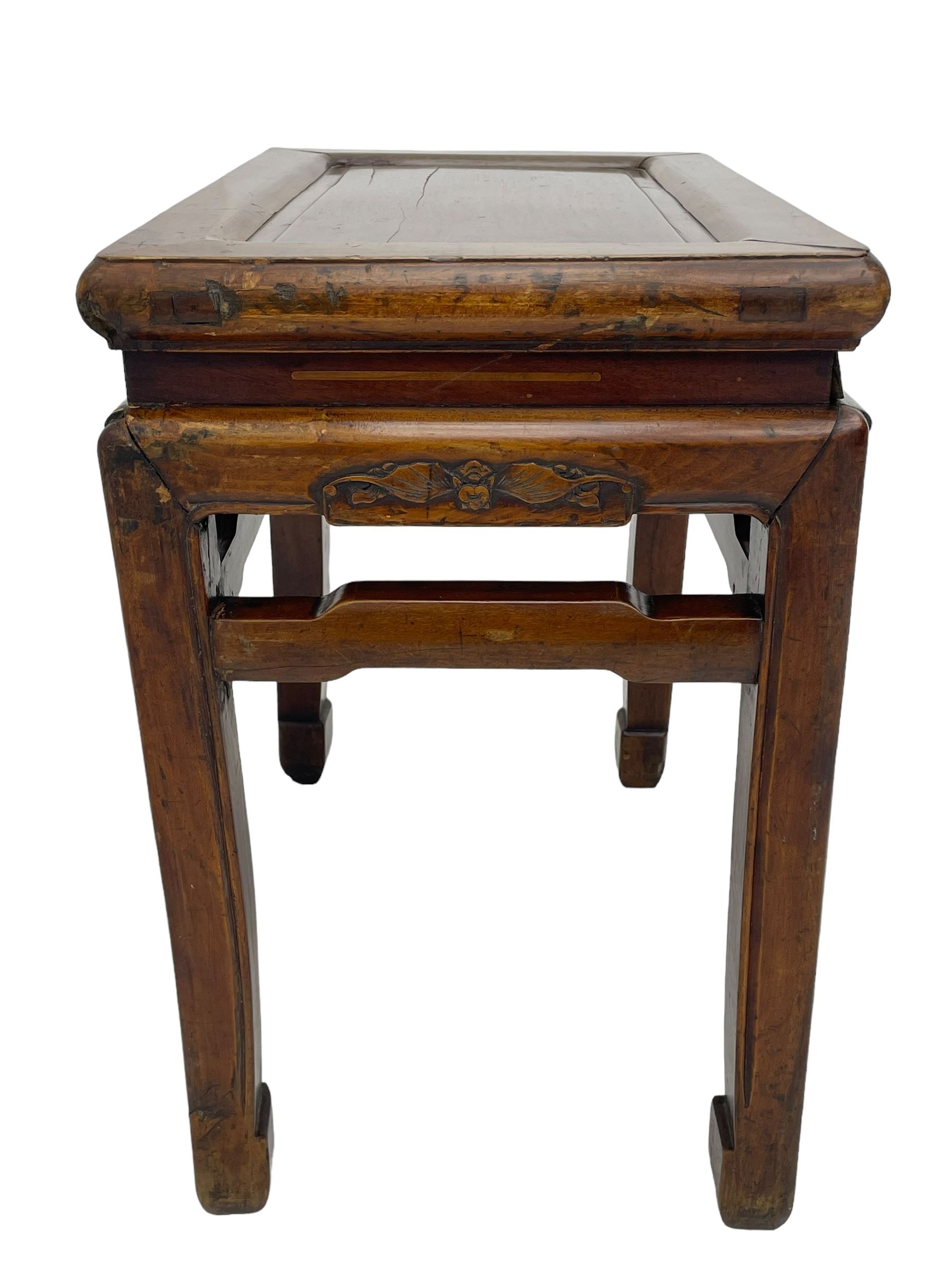 Pair of Chinese Hong Kong hardwood side tables, rectangular panelled top within moulded frame, the frieze rails carved with bats, on square supports terminating to hoof feet, united by shaped upper rails