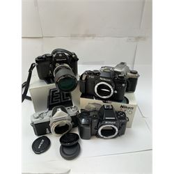 Collection of Nikon cameras, to include N65 serial no. 3103095, boxed, AF F-601 serial no. 2049522, boxed, F-801s serial no. 3330641, F-301 serial no. 3349050 and two Nikkormat cameras, to inlcude an EL example serial no. 5236494, with a nikkor Zoom 43-86mm 1:35 lens serial no. 913104, boxed and one other