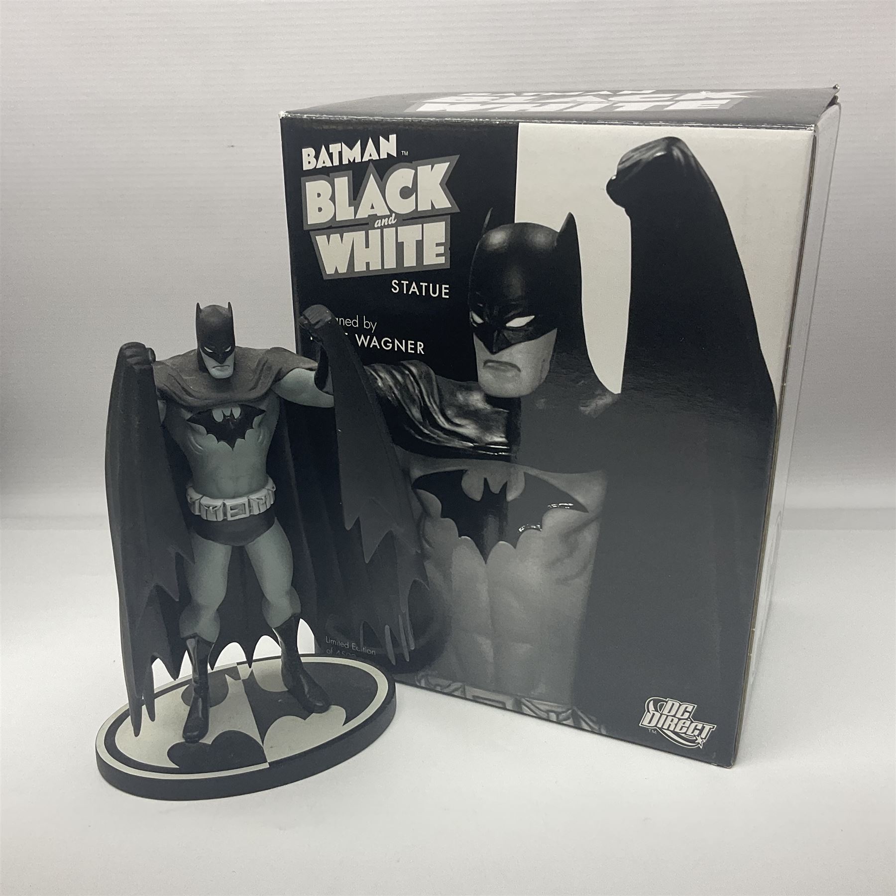 Group of five limited edition DC Direct Black and White Batman hand-painted cold-cast porcelain statues in original boxes, with two similar examples from DC Collectibles 