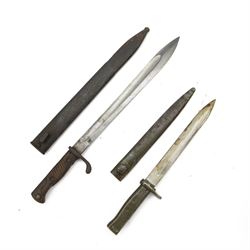 WWII M19 bayonets with steel scabbard, together with another WWII bayonet with steel scabbard 