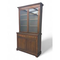 Edwardian walnut display cabinet, projecting moulded cornice over twin-glazed doors enclos...