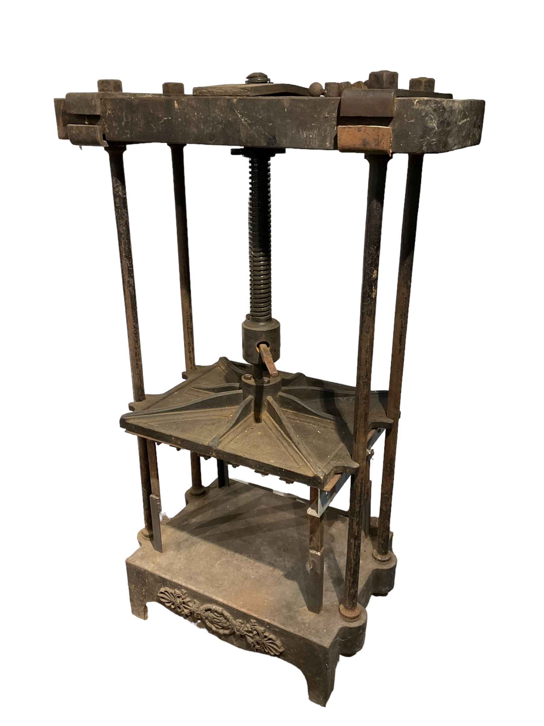 19th century and later cast iron book press on stand, with large screw action