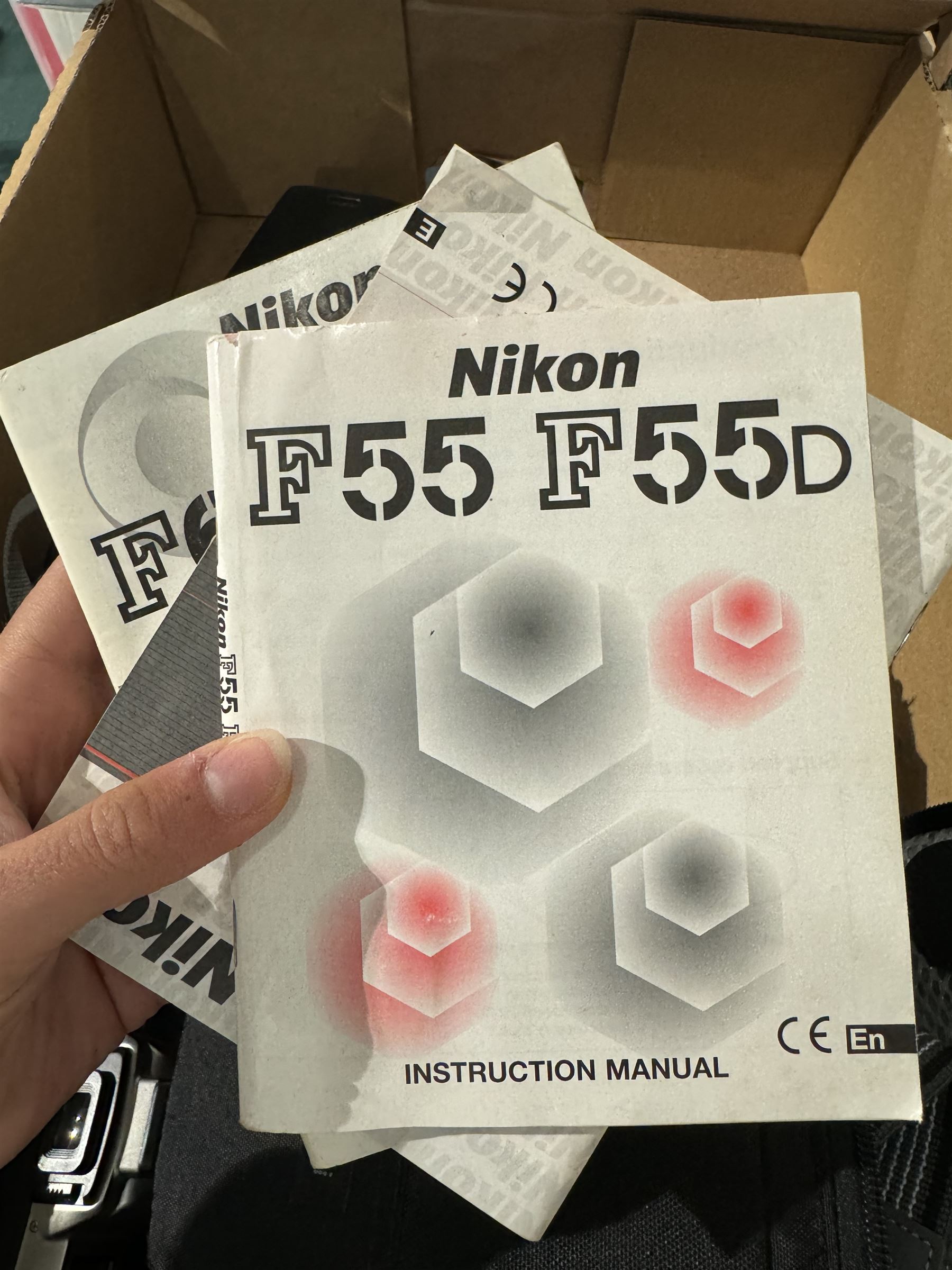 Collection of Nikon cameras, to include two F50 examples serial nos. 2966359 & 2243577, two F55 examples serial nos. 2608864 & 2024822, one with a AF Nikkor 28-80mm 1:3.3-5.6 G lens serial no. 3506212, F65 serial no. 2568057 and a F70 serial no. 2643064