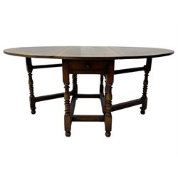 18th century oak dining table, oval drop-leaf top on gate-leg action base, turned supports united by turned stretchers, fitted with single end drawer