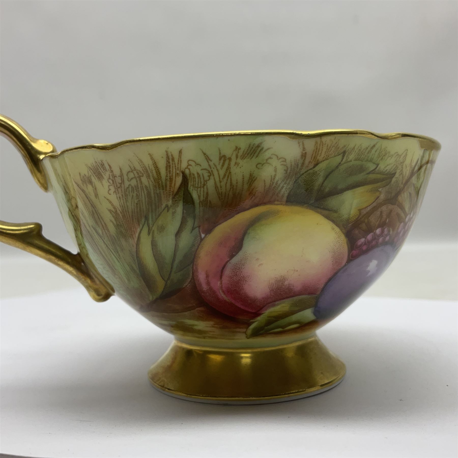 Pair Aynsley Orchard Gold pattern teacups and saucers with gilt interior 