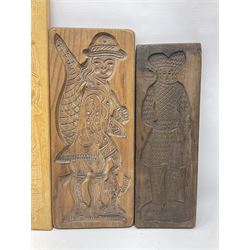 Eight 20th century hardwood Dutch folk art Speculaasplank or biscuit moulds, most examples typically carved with figures in traditional dress, tallest H60cm