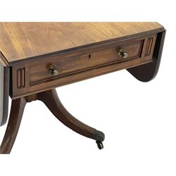 Early 19th century mahogany supper table, moulded drop-leaf top with rounded corners over two end drawers, on turned pedestal with four out-splayed supports, brass cups and castors 