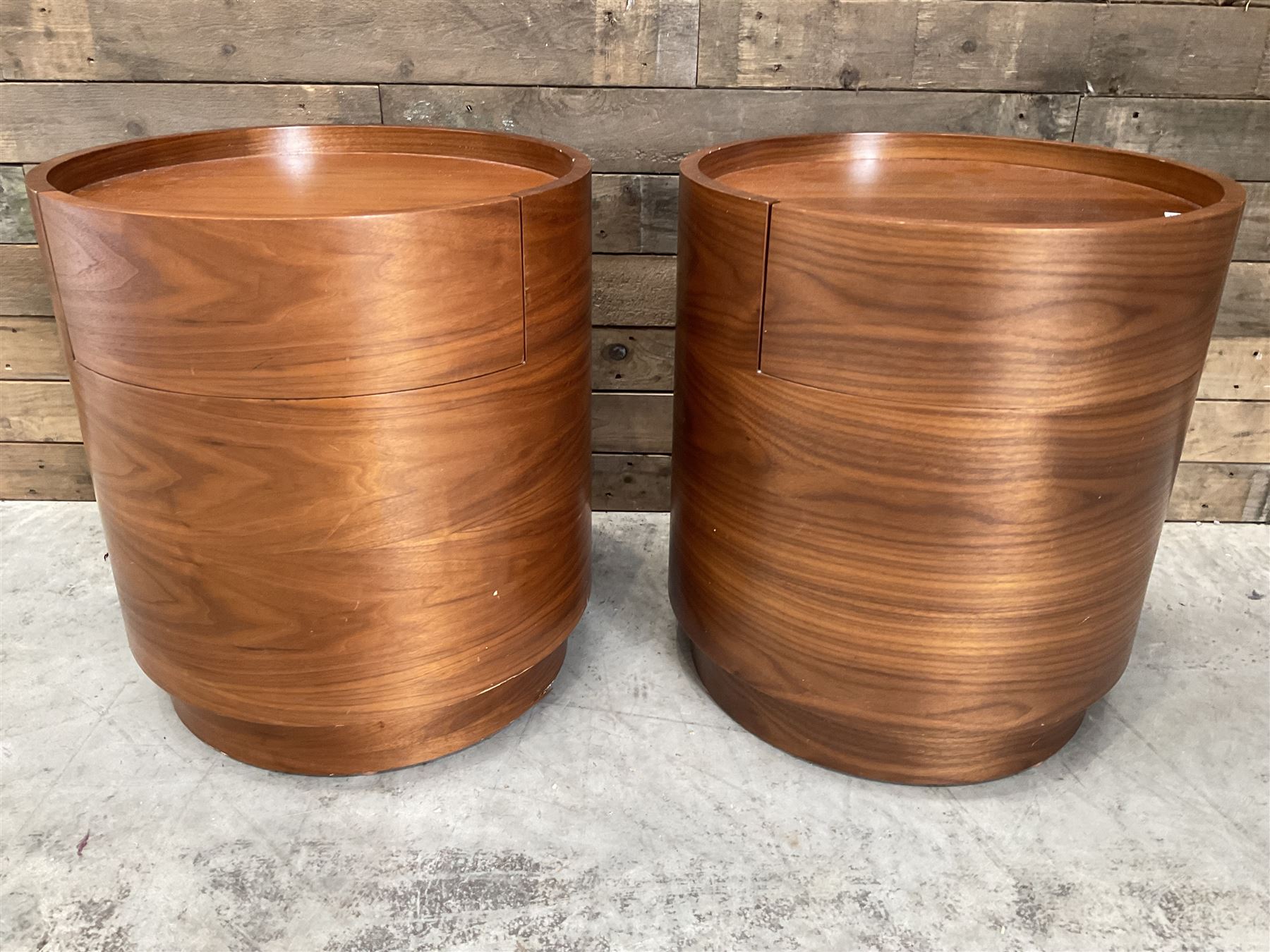 Pair of walnut circular barrel shaped lamp tables, fitted with single drawer