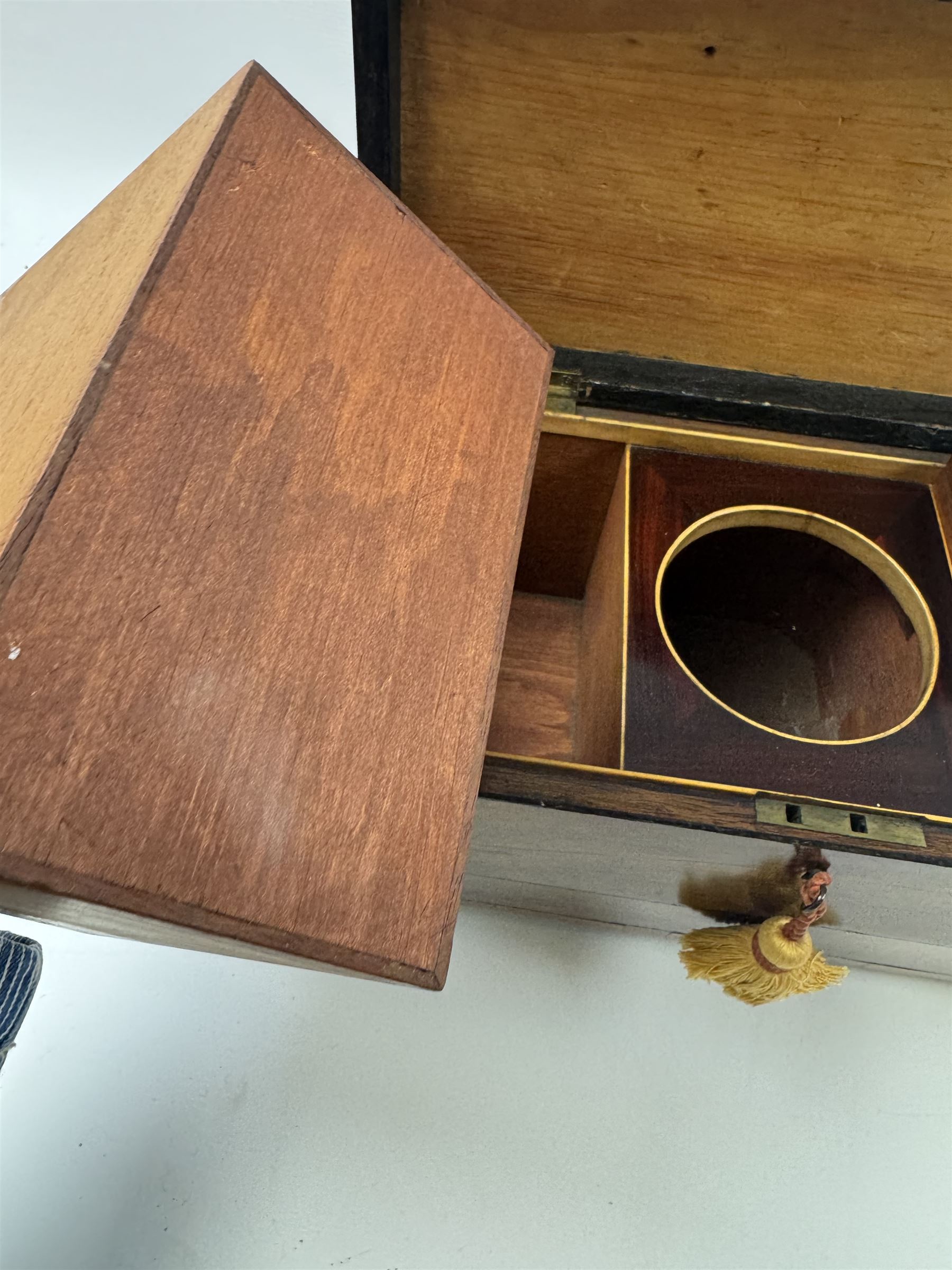 Georgian sarcophogus shaped tea caddy, with inlaid panels and twin lion mask handles, with mahogany compartmentalised interior, upon four bun feet, H22cm