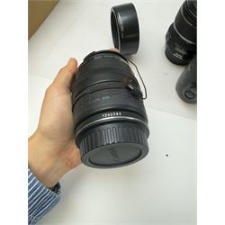 Six Canon camera lenses, to include EF 22-55mm 1;4-5.6 USM zoom lens serial no. 1507261, EF 35-105mm 1:3.5-4.5 zoom lens serial no. 1266383, EF-S 17-85mm 1:4-5.6 IS USM lens serial no. 8342906762, EF-S 18-55mm 1:3-5.6 IS zoom lens serial no. 6962045620, EF 35-80mm 1:4-5.6 power zoom lens serial no. 1903013B and AC 75-200mm 1:4.5 zoom lens serial no. 29445