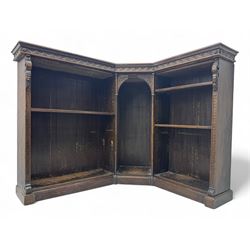 Victorian carved oak corner bookcase, L-shaped form, moulded top over lunette carved friez...