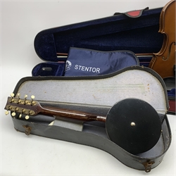 The Stentor Student II violin with 35.5cm two-piece maple back and ribs and spruce top, bears label, 59cm overall, in fitted carrying case with bow; and a small eight-string mandolin banjo with ebonised back and sides and mahogany neck L51cm, cased (2)